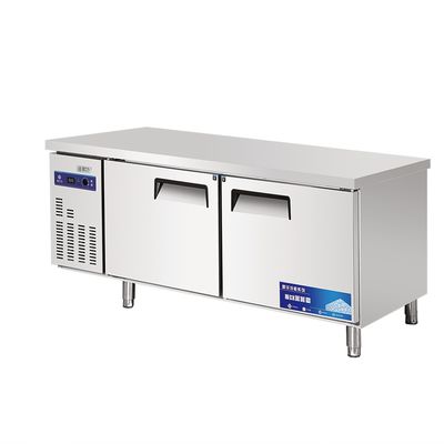 Stainless steel commercial refrigerator workbench in the back kitchen of hotel restaurant